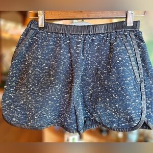 Tweed shorts with leather trim